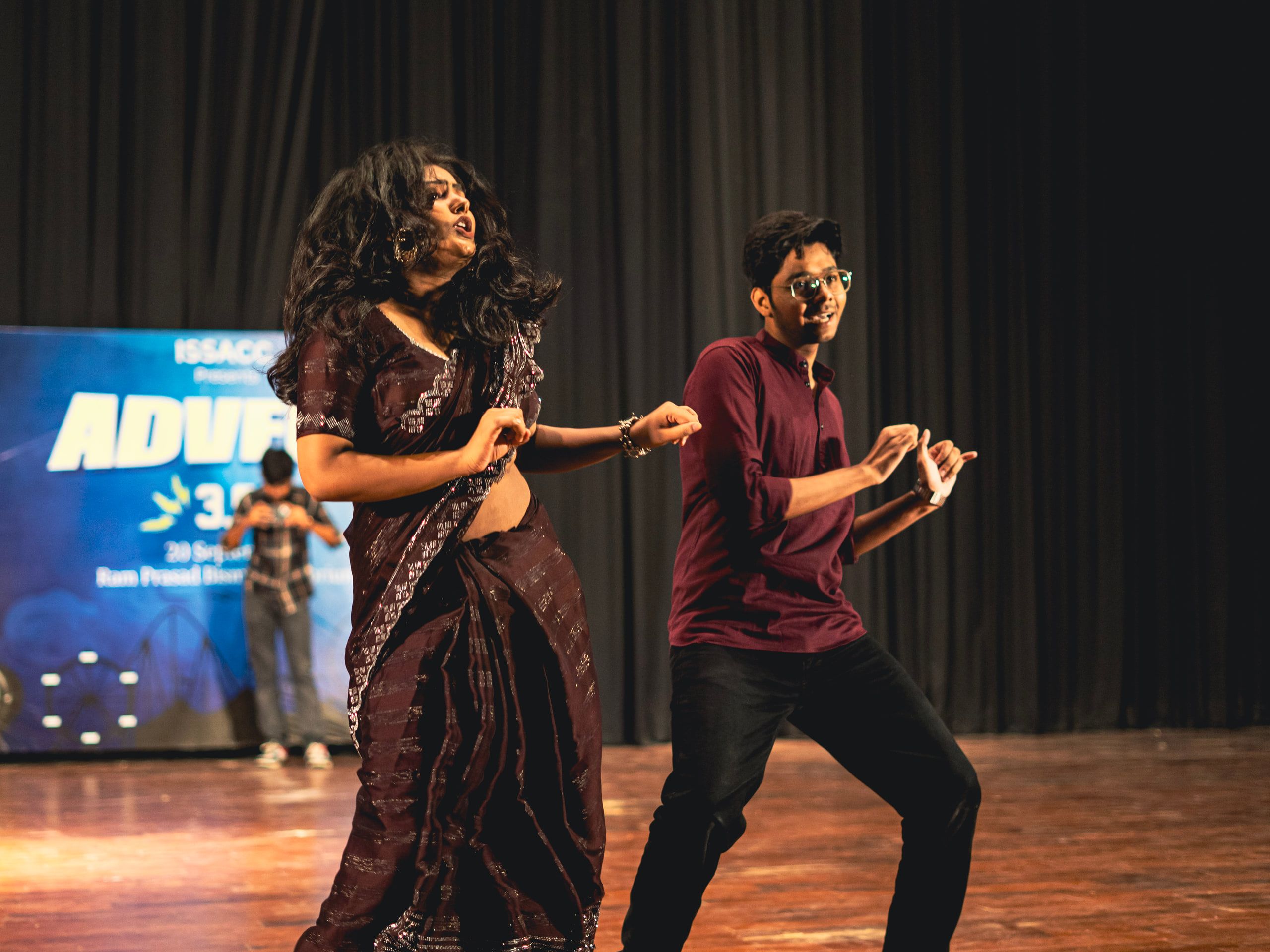 Two dancers performing a duet on stage